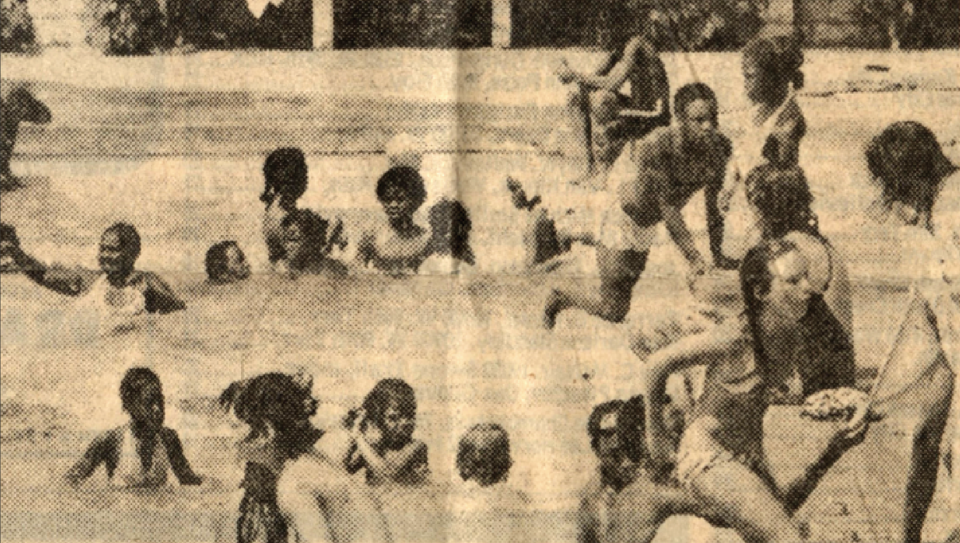 Kids swimming in a public pool