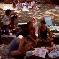People seated at picnic