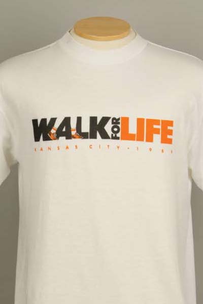 1989 white AIDS Walk T-Shirt, black and orange logo